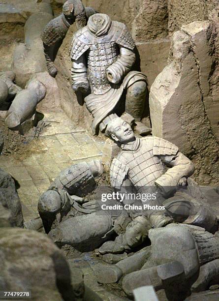 View of the ancient terracotta warriors is seen in the No.2 pit of the Qin Terracotta Warriors and Horses Museum on October 24, 2007 in Lintong of...