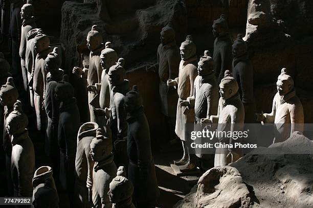 Ancient terracotta soldiers are seen in the No.1 pit of the Qin Terracotta Warriors and Horses Museum on October 24, 2007 in Lintong of Shaanxi...
