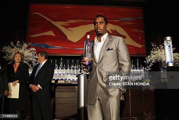 Sean "Diddy" Combs holds a bottle of Ciroc Vodka made by Diageo, 24 October 2007, after announcing an alliance with the vodka brand in New York. Sean...