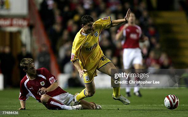 Gregory Vignal of Southampton is tackled by David Noble of Bristol during the Coca-Cola Championship match between Bristol City and Southampton at...