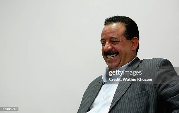 Tribal leader Kanian Al-Sadid, poses for photos at Cob Speicher on October 4, 2007 in the city of Tikrit in Salah Addin province about 110 miles...