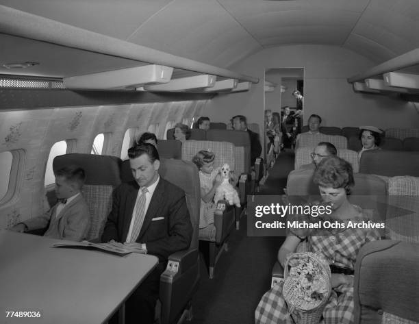 S: Passengers on a Transocean Air lines Boeing 377 Stratocruiser in the mid 1950's. Transocean Air lines flew between 1946 and 1962 and was a pioneer...