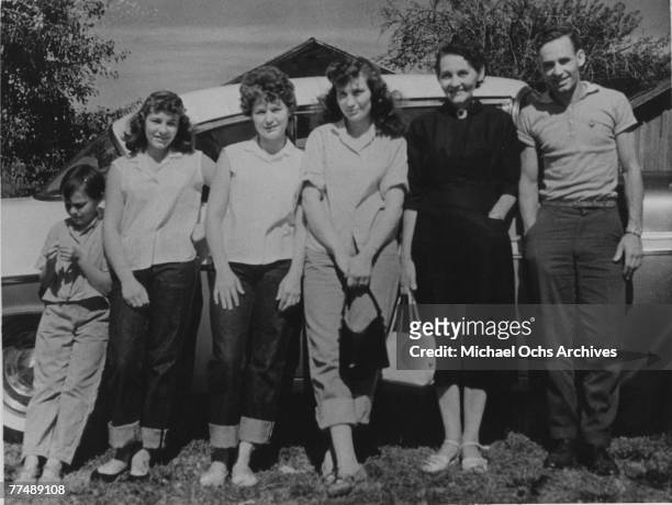 Country singer Loretta Lynn poses for a portrait with her familyr in circa 1955 in Butcher Holler, Kentucky.