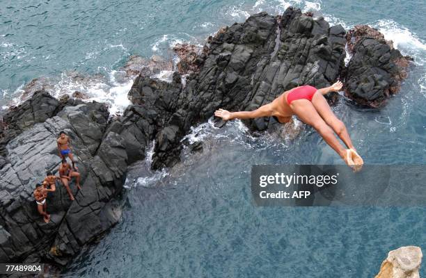 Cliff diver jumps from "La Quebrada" cliff in Acapulco, Mexico, on September 29th, 2007. The tradition of "La Quebrada" goes back to 1934, when two...