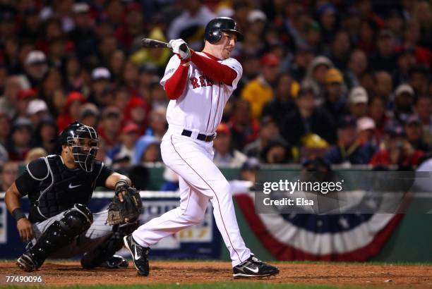 Drew of the Boston Red Sox doubles in the first inning during Game One of the 2007 Major League Baseball World Series against Colorado Rockies at...