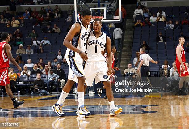 Rudy Gay and Kyle Lowry of the Memphis Grizzlies celebrate their lead over the Houston Rockets on October 24, 2007 at the FedExForum in Memphis,...