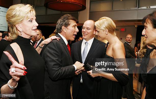 Elaine Wynn, Steve Wynn, Prince Albert II of Monaco, Charlene Wittstock and Consul General of Monaco Maguy Maccario Doyle talk at the Consulate...