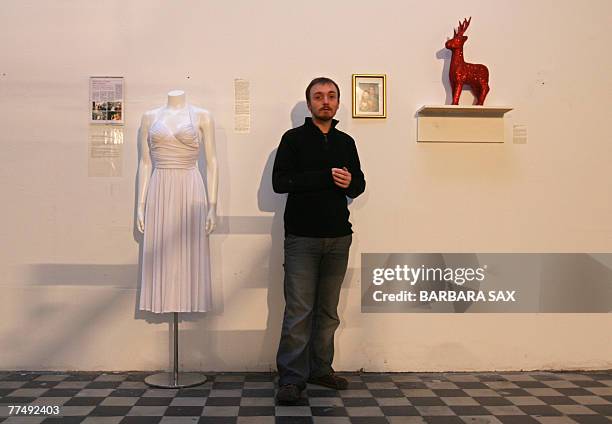 By ANNE PADIEU - Zvonimir Dobrovic, organiser of the Berlin stage of the "Museum of Broken Relationships" stands between two objects brought from...