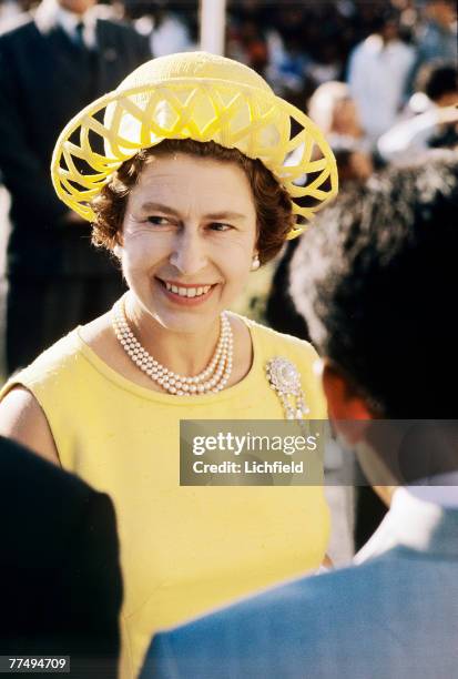 The Queen on a walkabout on the Seychelles in March 1972. Part of a series of photographs taken for use during the Silver Wedding Celebrations in...