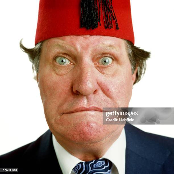 Welsh prop comedian and magician Tommy Cooper on 14th July 1980. .