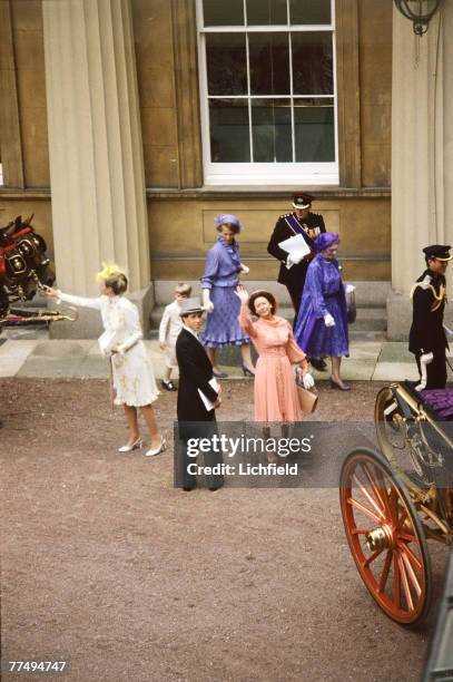 The Princess Margaret waving from the Courtyard at Buckingham Palace after the Royal Wedding on 29th July 1981. HRH The Princess Anne, The Earl of...