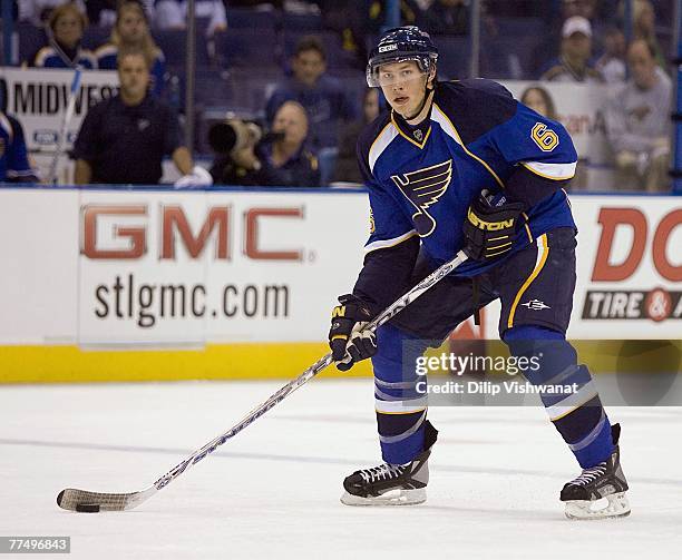 Erik Johnson of the St. Louis Blues handles the puck against the Minnesota Wild on September 28, 2007 at the Scottrade Center in St. Louis, Missouri.