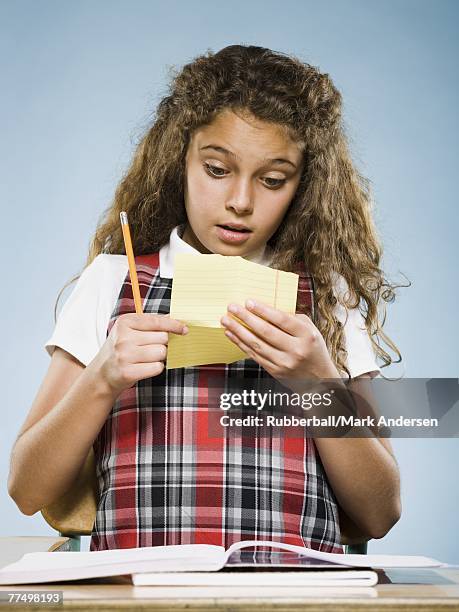 Child Reading From Note Kids Passing Notes Photos and Premium High Res Pictures - Getty Images
