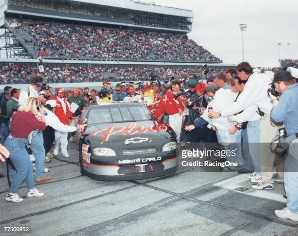 Dale Earnhardt Sr. Driver of the GM Goodwrench Chevrolet drives to victory lane after winning the 1998 NASCAR Winston Cup Daytona 500 at the Daytona...