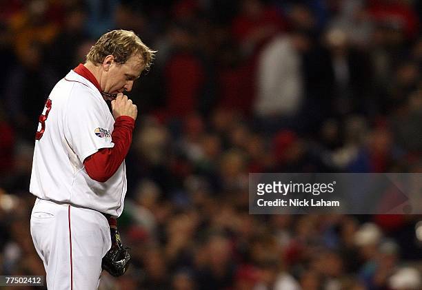 Curt Schilling of the Boston Red Sox takes a moment before pitching Game Two of the 2007 Major League Baseball World Series against the Colorado...