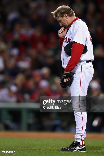 Curt Schilling of the Boston Red Sox takes a moment before pitching Game Two of the 2007 Major League Baseball World Series against the Colorado...