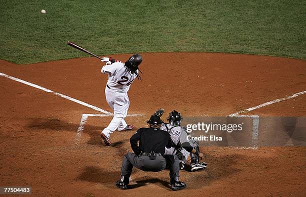 Manny Ramirez of the Boston Red Sox connects for a double against the Colorado Rockies during Game Two of the 2007 Major League Baseball World Series...