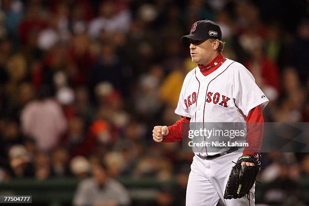 Curt Schilling of the Boston Red Sox pumps his against the Colorado Rockies during Game Two of the 2007 Major League Baseball World Series at Fenway...