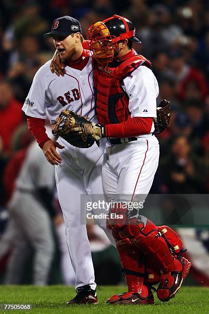 Jonathan Papelbon and Jason Varitek of the Boston Red Sox celebrate their victory over the Colorado Rockies during Game Two of the 2007 Major League...