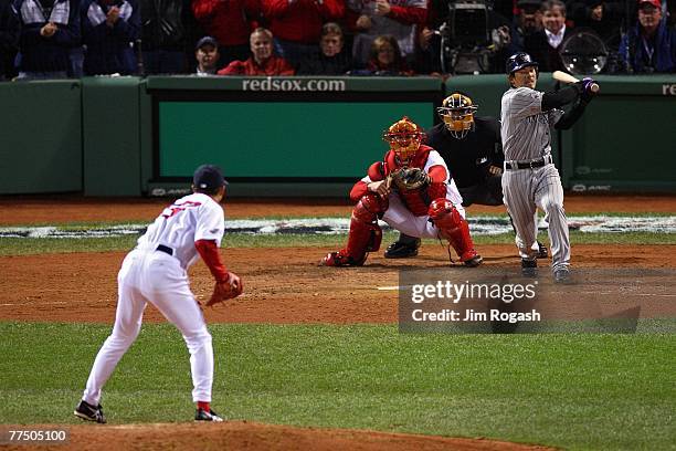 Hideki Okajima of the Boston Red Sox pitches against Kazuo Matsui of the Colorado Rockies during Game Two of the 2007 Major League Baseball World...