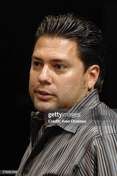Armando Montelongo of the television show "Flip This House" watches the game between the Los Angeles Kings and the Dallas Stars at Staples Center on...