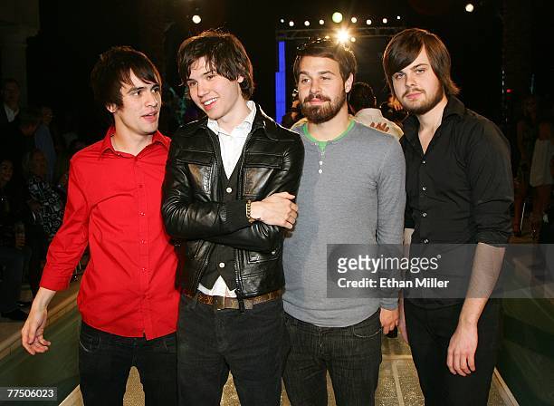 Members of the band Panic! at the Disco frontman Brendon Urie, guitarist Ryan Ross, bassist Jon Walker and drummer Spencer Smith, pose at a...