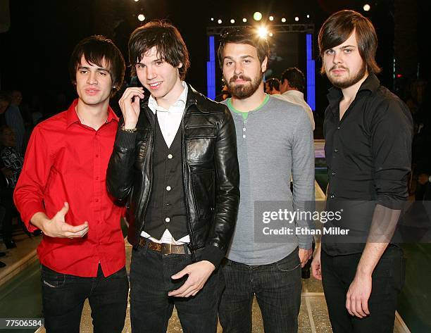 Members of the band Panic! at the Disco frontman Brendon Urie, guitarist Ryan Ross, bassist Jon Walker and drummer Spencer Smith, pose at a...