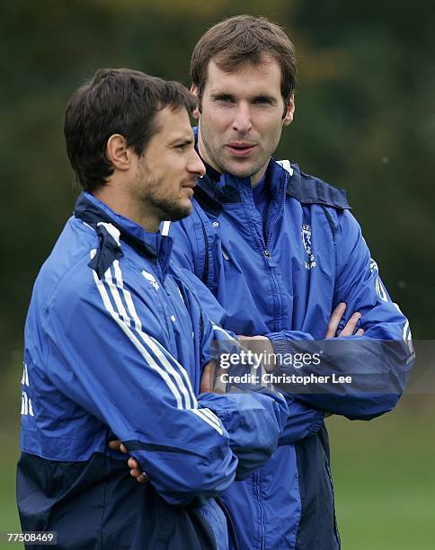 Petr Cech and Carlo Cudicini of Chelsea watch the New York Giants in training during the Giants training Session at Chelsea FC Training Ground on...