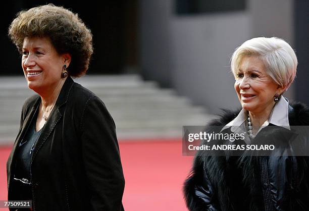 Carla and Anna Fendi, the daughters of Edoardo Fendi, who founded the Italian fashion house Fendi, pose before the screening of "Enchanted" at the...