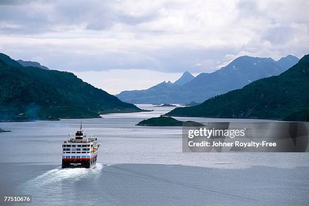 cruising ship at a fiord in norway. - fjord stock pictures, royalty-free photos & images