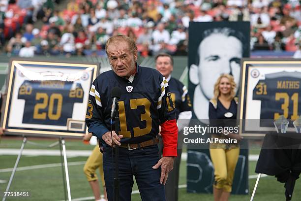 Former Wide Receiver Don Maynard waves to the crowd as the New York Jets honored four of their original New York Titans players who also played on...