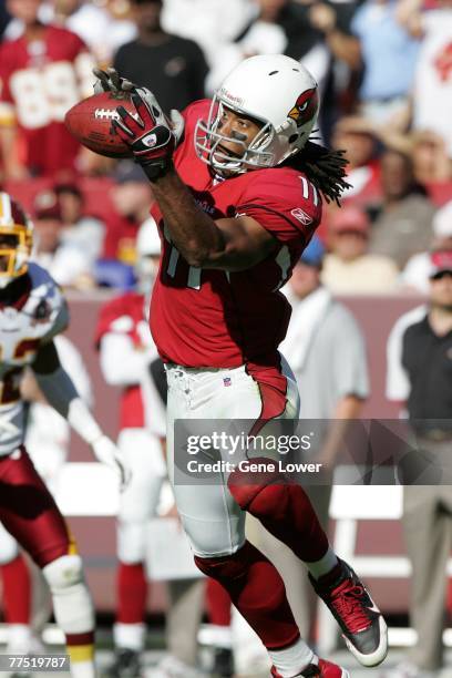 Wide receiver Larry Fitzgerald of the Arizona Cardinals makes a catch during a game against the Washington Redskins on October 21, 2007 at FedEx...