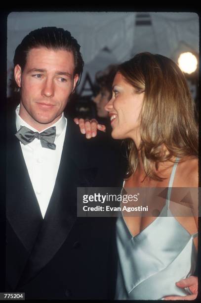 Actor Ed Burns and his girlfriend actress Maxine Bahns attend the Council of Fashion Designers of America awards February 12, 1996 in New York City....