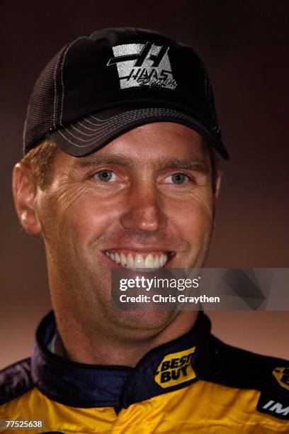 Jeremy Mayfield, driver of the Best Buy Chevrolet, stands on the grid during qualifying for the NASCAR Nextel Cup Series Pepboys Auto 500 at Atlanta...