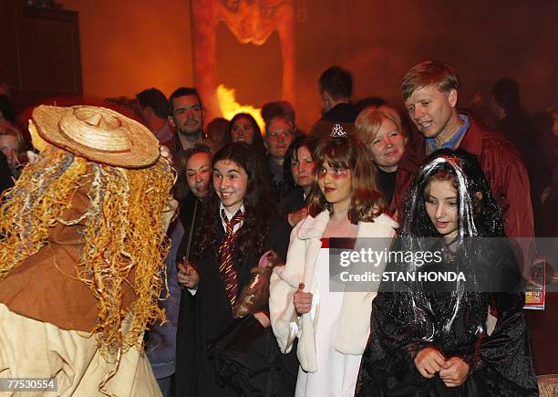 Girls in costumes watch the "Halloween Extravaganza & Procession of the Ghouls", 26 October 2007, in The Cathedral Church of St. John the Divine in...