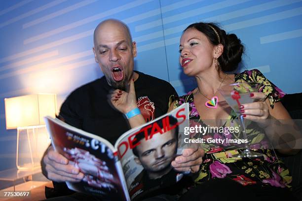 Guests attend a party hosted by DKNY Jeans and DETAILS magazine with a performance by Matthew Dear at the Stoli Hotel October 26, 2007 in Chicago,...