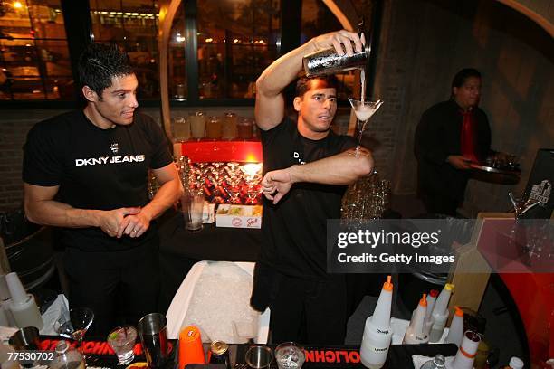 Guests attend a party hosted by DKNY Jeans and DETAILS magazine with a performance by Matthew Dear at the Stoli Hotel October 26, 2007 in Chicago,...