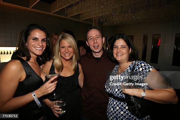 Guests attend a party hosted by DKNY Jeans and DETAILS magazine with a performance by Matthew Dear at the Stoli Hotel October 26, 2007 in Chicago,...