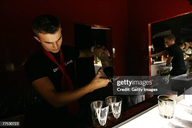 Guests attend a party hosted by DKNY Jeans and DETAILS magazine with a performance by Matthew Dear at the Stoli Hotel October 26, 2007 in Chicago,...