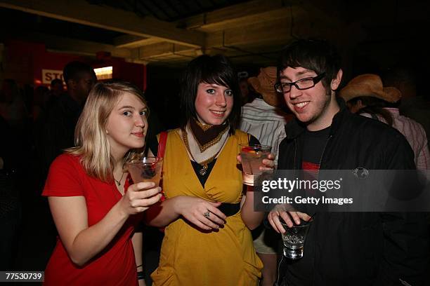 Guests attend a party hosted by DKNY Jeans and DETAILS magazine with a performance by Matthew Dear at the Stoli Hotel October 26, 2007 in Chicago,...