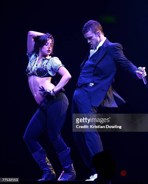 Singer Justin Timberlake performs on stage at the first Australian concert of his "FutureSexLoveShow" at the Brisbane Entertainment Centre on October...