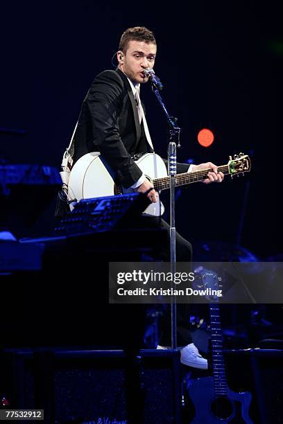 Singer Justin Timberlake performs on stage at the first Australian concert of his "FutureSexLoveShow" at the Brisbane Entertainment Centre on October...