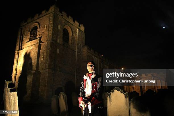 Dracula fan Ray Wells, poses under the full moon near Whitby Abbey during Whitby Gothic Weekend on October 26, 2007 in Whitby, England. Whitby Gothic...