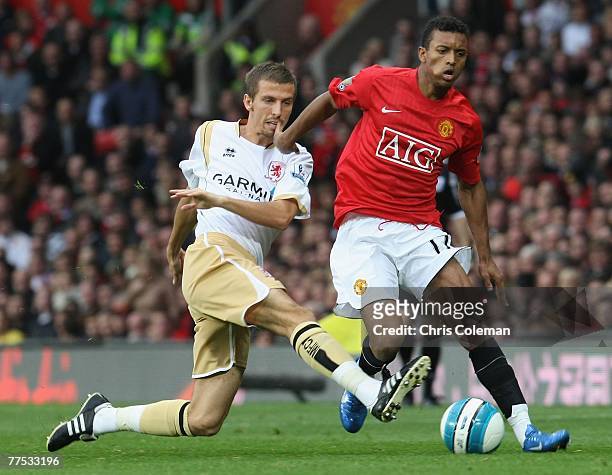 Nani of Manchester United clashes with Gary O'Neil of Middlesbrough during the Barclays FA Premier League match between Manchester United and...