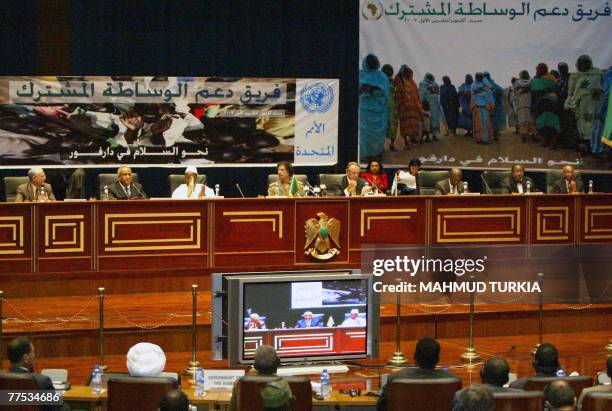 General view shows African leaders, UN envoys and AU negotiators attending a peace conference aimed at ending four years of bloodshed in Sudan's...