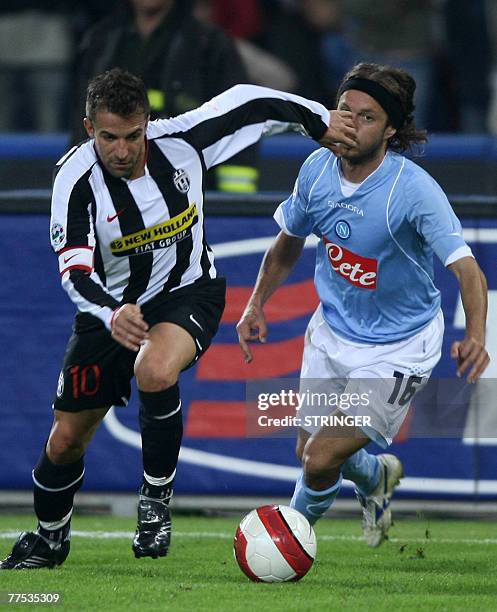 Juventus' captain Alex Del Piero Marcelo Zalayeta fights for the ball with S.S.C. Napoli' Andrea Cupi during their Calcio football match...