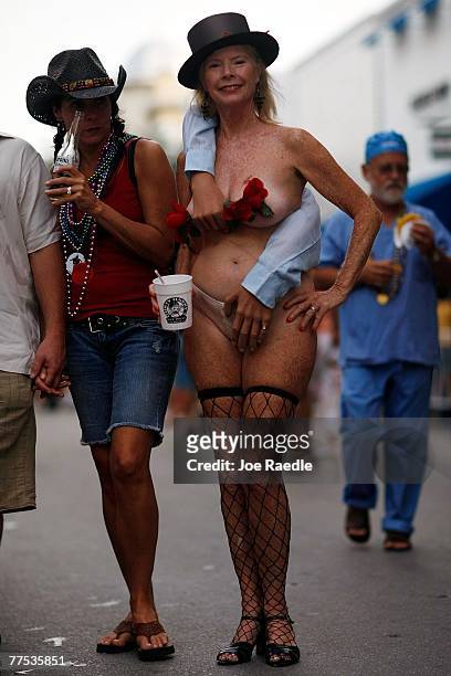 Women participating in the Fantasy Fest Masquerade March wears her custome October 27, 2007 in Key West, Florida. The 10-day costuming and masking...