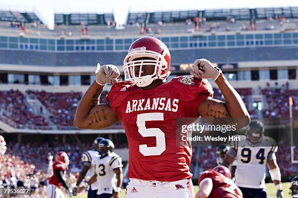 Darren McFadden of the Arkansas Razorbacks does his 501 pose after scoring a touchdown against the Florida International Golden Panthers at Donald W....