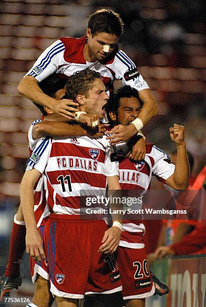 Dallas' players celebrate Clarence Goodson's goal in overtime during the game at Pizza Hut Park in Frisco Texas. Colorado won the game 5-4 on PKs....