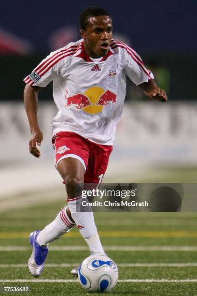 Dane Richards of the New York Red Bulls runs with the ball against the New England Revolution during their Eastern Conference Semifinal match at...